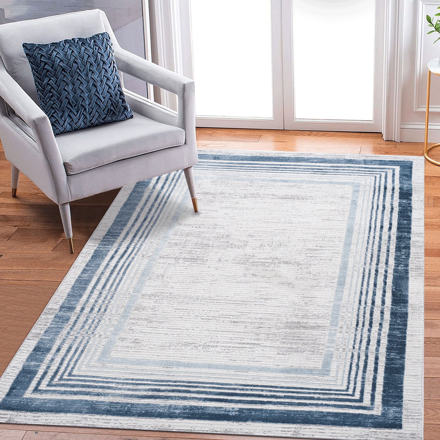 Marfi - 6' X 9' Bordered Area Rug - Blue / Ivory